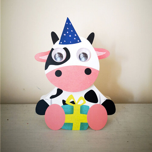 wiebelhoofd wenskaart - koe met cadeautje